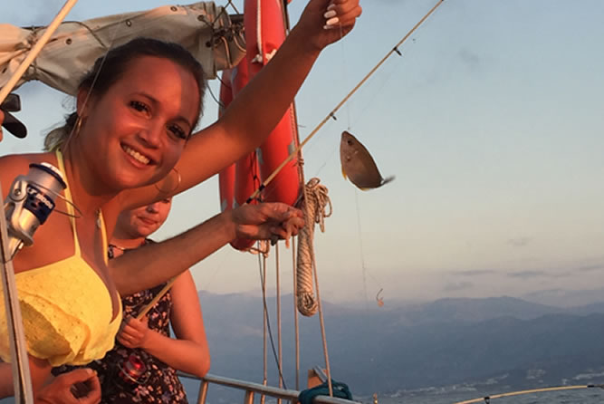 Reeling in catches during a guided fishing trip in Crete